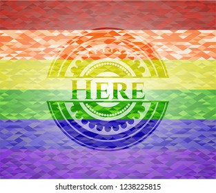 Here emblem on mosaic background with the colors of the LGBT flag