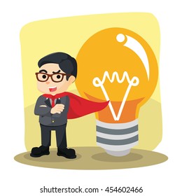 Hero businessman standing next to the big bulb