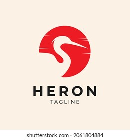 Heron logo concept silhouette in a circle sunset
