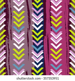Herringbone striped brushsrokes  vector seamless pattern with ethnic  motif. Hand painted. Plaid design. Purple, lime, hot pink colors.