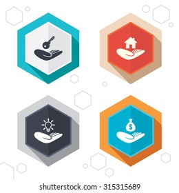 Hexagon buttons. Helping hands icons. Financial money savings insurance symbol. Home house or real estate and lamp, key signs. Labels with shadow. Vector