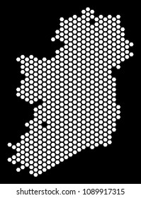 Hexagonal Ireland Island map. Vector territory scheme on a black background. Abstract Ireland Island map concept is organized of hex tile cells.