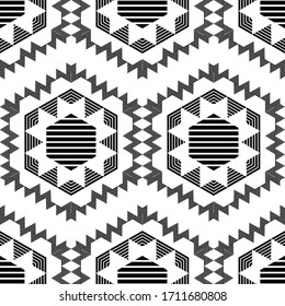 Hexagons and Snowflakes. Ethnic boho ornament. Seamless background. Tribal motif. Vector illustration for web design or print.