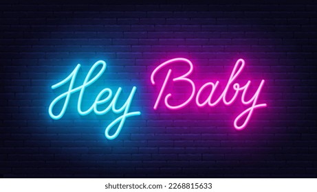 Hey Baby neon lettering on brick wall background.