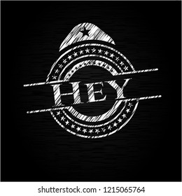 Hey chalkboard emblem written on a blackboard