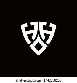HH monogram logo with modern shield style design template isolated on black background