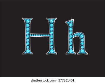 Hh in stunning Aquamarine precious round jewels set into a 2-level gold gradient channel setting, isolated on black. Vector EPS-10 file, transparency used. 