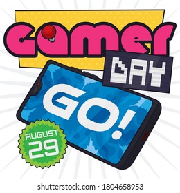 Hi tech cell phone, retro sign with joystick, screen and round label promoting to play video games during Gamer Day celebration this 29th August.