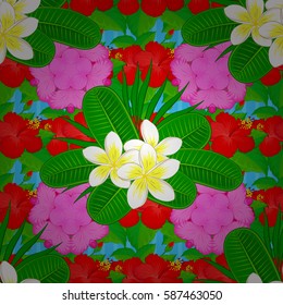 Hibiscus flowers seamless pattern on a blue background.