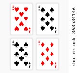 High Angle View of Four Playing Cards Spread Out on White Background Showing Eights from Each Suit - Hearts, Clubs, Spades and Diamonds