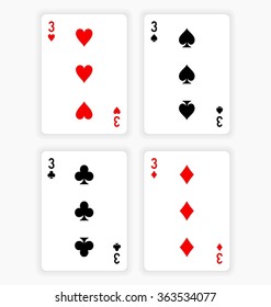 High Angle View of Four Playing Cards Spread Out on White Background Showing Threes from Each Suit - Hearts, Clubs, Spades and Diamonds