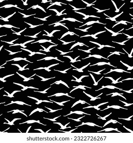 High contrast abstract pattern of bird silhouette in flight