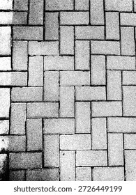 Patrón de bloques de pavimento blanco y negro de alto contraste. Ilustración geométrica minimalista de textura de piso de ladrillo en espiga para fondos de diseño industrial, urbano y arquitectónico.