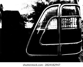 High contrast black and white vector illustration of a vintage car rear taillight assembly and protective corner frame.