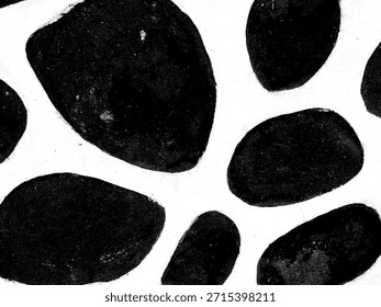 High contrast monochrome texture of rounded dark shapes against a bright white background. Abstract natural stone pattern for graphic design or repeating background