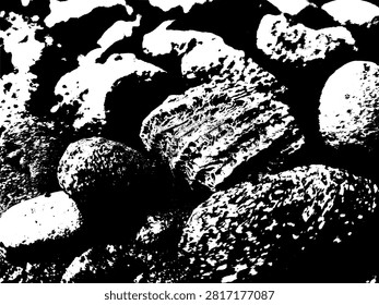 High contrast vector silhouette of river stones and rough pebbles texture. Abstract black and white monochrome background of craggy rock pile graphic asset.