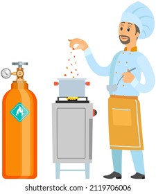High cylinder, canister next to man cooking soup on gas stove. Metal tank with liquefied compressed substance. Chef using stove with burners for cooking powered by gas supplied from container