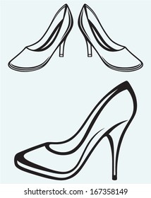 High heel shoes isolated on blue background