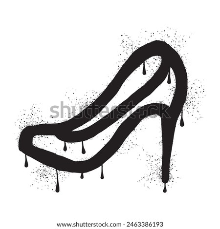 High heels with black spray paint graffiti