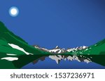 High mountains with snow and lake