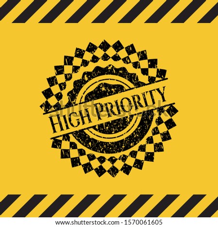 High Priority black grunge emblem with yellow background. Vector Illustration. Detailed.