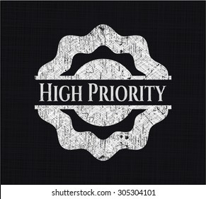 High Priority chalk emblem written on a blackboard
