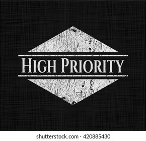 High Priority chalk emblem written on a blackboard