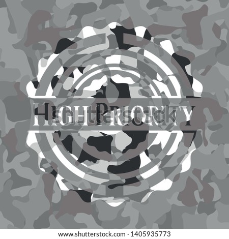 High Priority on grey camouflaged texture