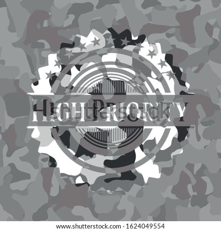 High Priority on grey camouflaged texture