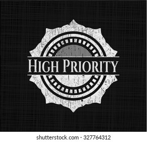 High Priority written on a blackboard