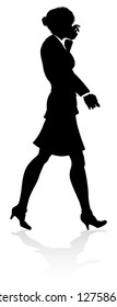 A high quality business person silhouette with reflection