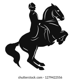 Higher school of riding. Silhouette of a horse and rider executing a levade.