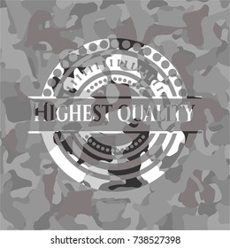Highest Quality written on a grey camouflage texture