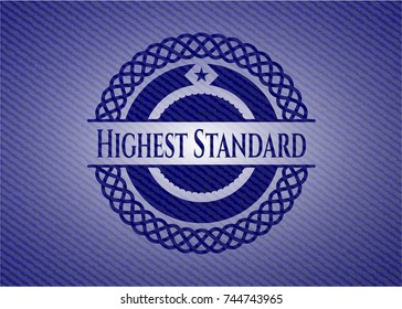 Highest Standard badge with denim background
