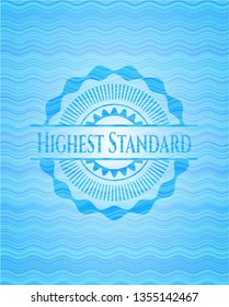 Highest Standard light blue water wave badge background.