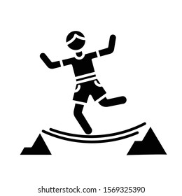Highlining glyph icon. Slacklining. Walking and balancing on tightrope. Slackliner in mountains. Extreme sport stunt. Walker on rope. Silhouette symbol. Negative space. Vector isolated illustration