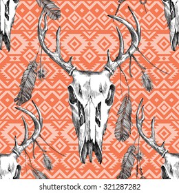 highly detailed seamless pattern with deer skull, feathers and tribal ornaments 