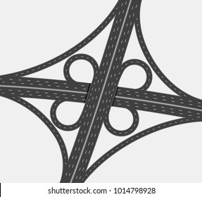 Highway crossroad, two level traffic junction, four way interchange with loop ramps and white road marks. Top view, close up.