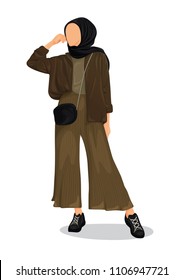 A hijab girl with green army fashion outfit like shirt, long culottes pants, sport shoes, sling bag, and simple black hijab for campus outfit