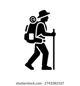 A hiker with a backpack and trekking pole