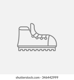 Hiking boot with crampons line icon for web, mobile and infographics. Vector dark grey icon isolated on light grey background.