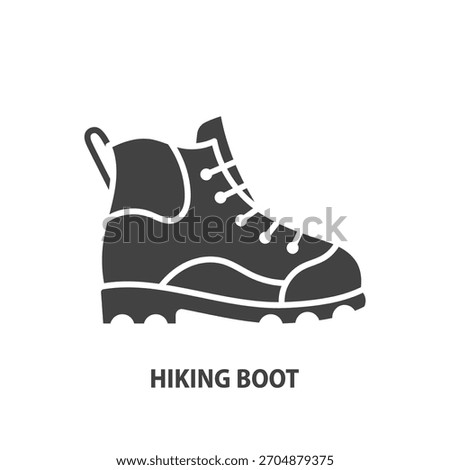 Hiking boot glyph icon. Track shoe vector sign.