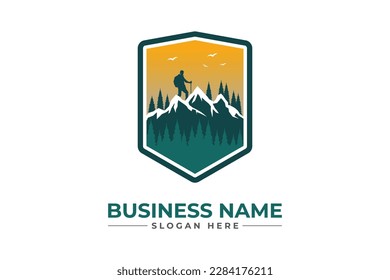 Hiking logo with man sunset and bird adventure Mountain Outdoor wilderness travel logo