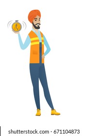 Hindu builder showing ringing alarm clock. Full length of young builder with alarm clock. Happy builder holding alarm clock. Vector flat design illustration isolated on white background.