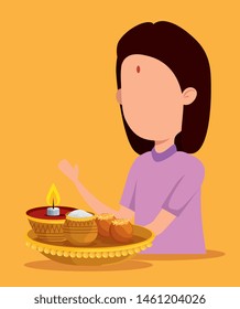 hindu girl with candle and traditional food