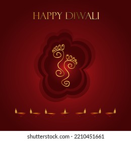 Hindu Goddess Laxmi's footprint for good luck with text of Diwali greetings red background