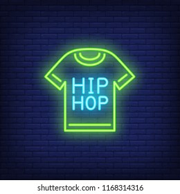 Hip-hop t-shirt neon sign. Luminous signboard with garment. Night bright advertisement. Vector illustration in neon style for music, party, fashion
