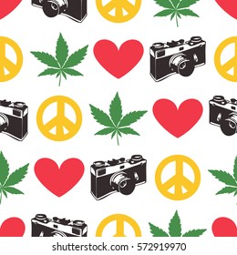 Hippie seamless pattern with cannabis leaves,  old camera, heart, peace symbol isolated on white. Wrapping paper. Vector illustration