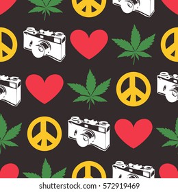 Hippie seamless pattern with marijuana leaves,  old camera, heart, peace symbol on black background. Wrapping paper. Vector illustration
