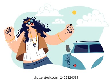 Hippie woman dances standing near minivan and celebrates start of travel or summer vacation. Hippie girl with symbol of pacifism on chain goes on tourist trip or to woodstock festival